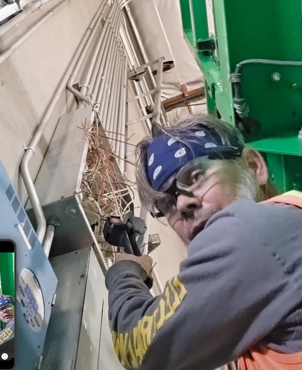 Jon Conant working in the field